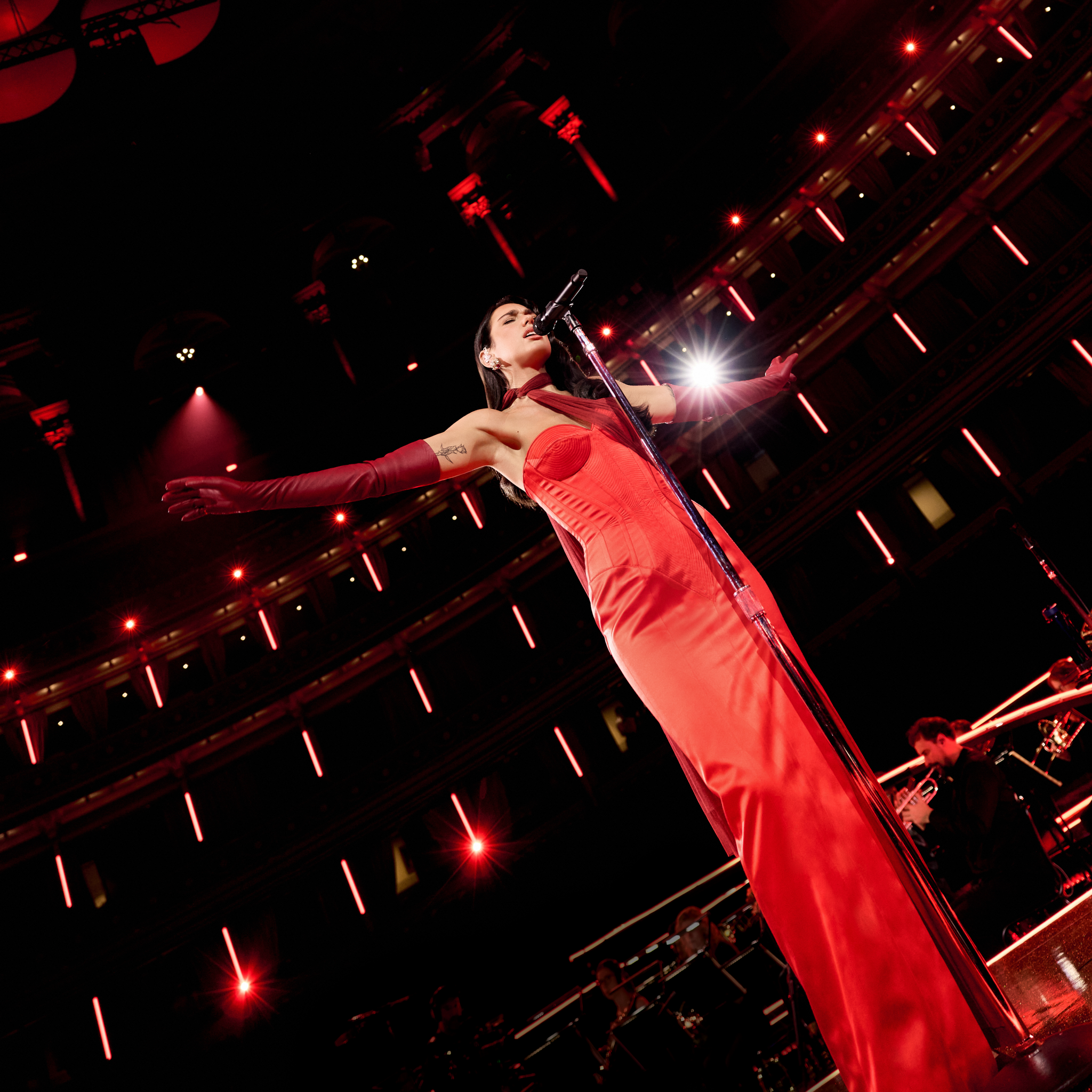 dua lipa red dress royal albert hall Dua Lipa Opts For Old Hollywood Ball Gown During London Concert